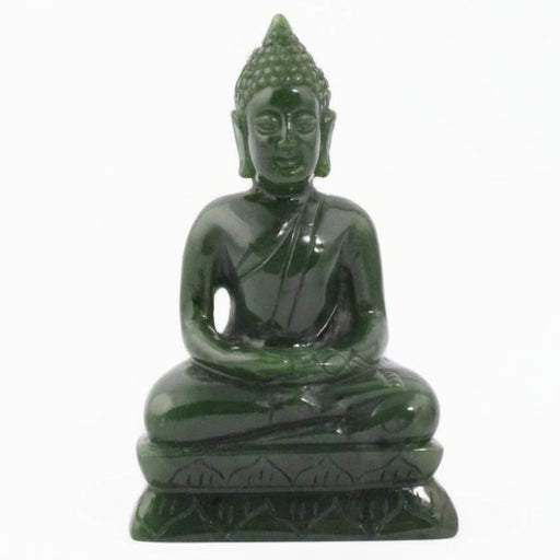 Green stone Buddha statue on a white background