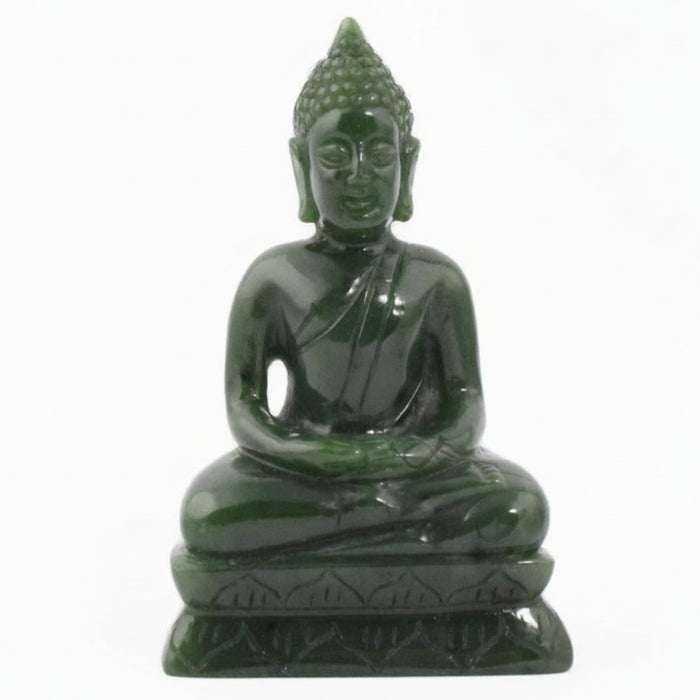 Green stone Buddha statue on a white background