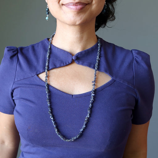 woman wearing iolite necklace