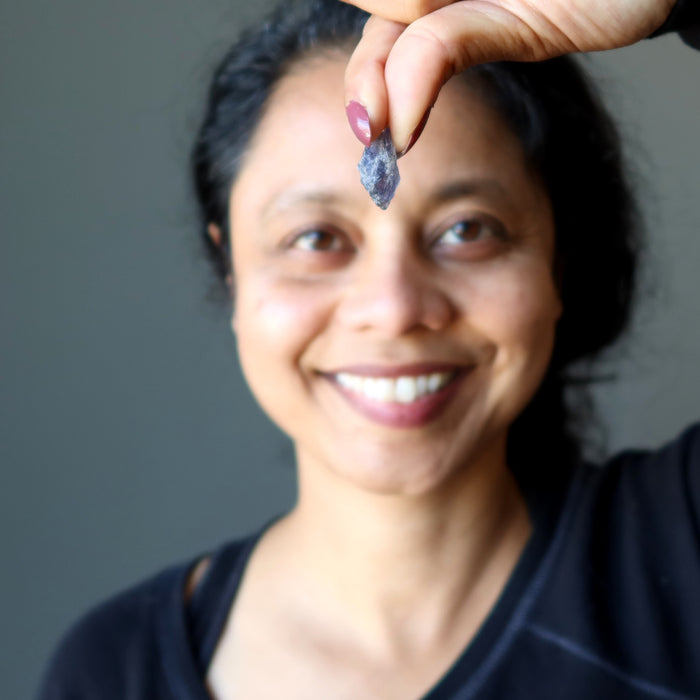 raw iolite stone at third eye