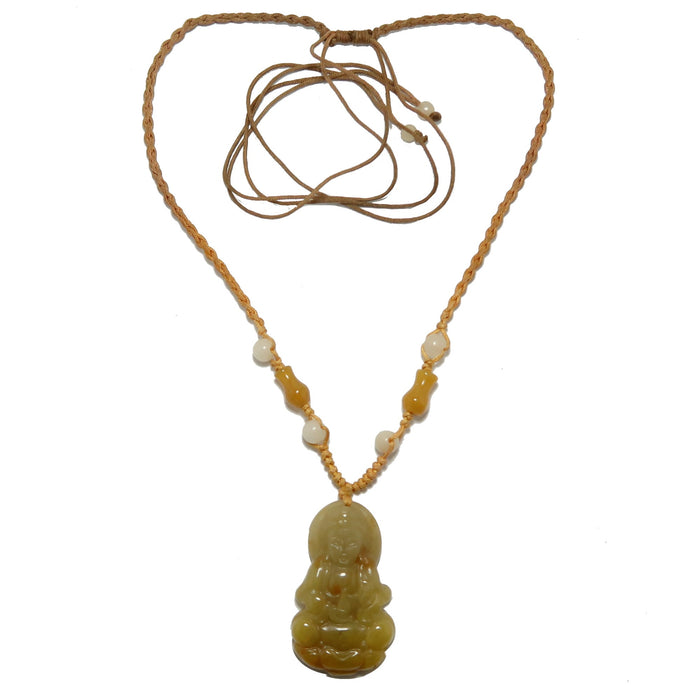 Yellow Jade Kwan Yin Necklace with a pendant on a white background