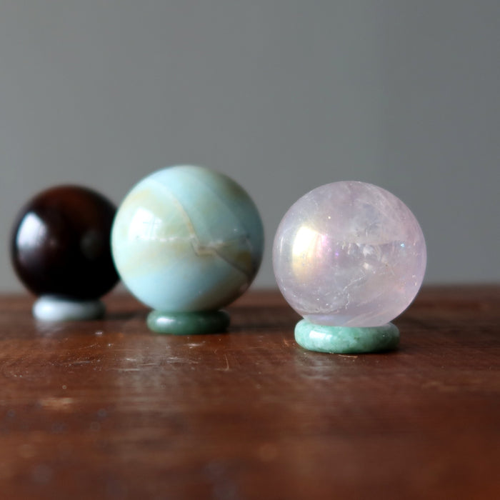spheres on jade ring display stands