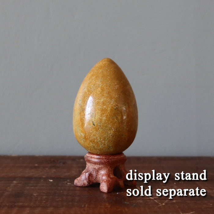 brown jasper egg on display stand