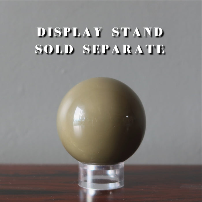 green jasper sphere on display stand