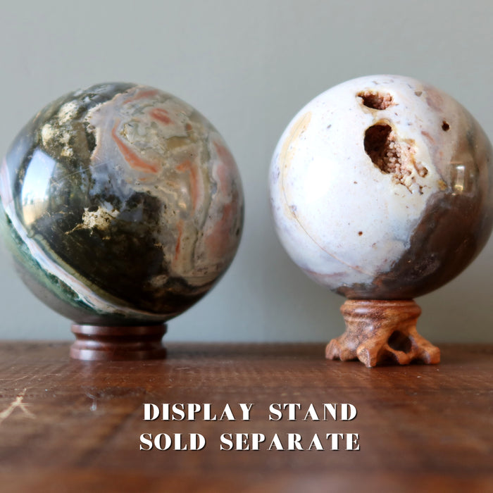 ocean jasper balls on wood stands