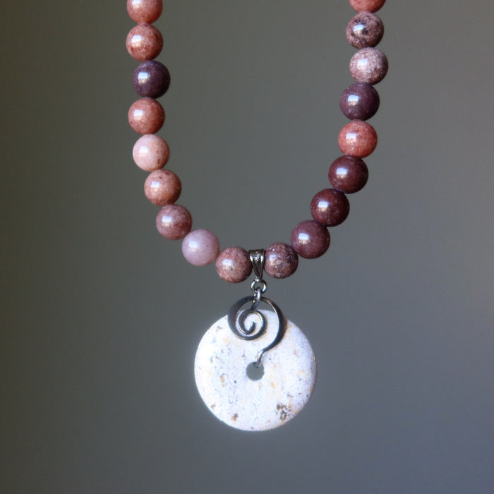 Necklace with purple aventurine beads and a round jasper pendant