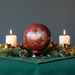 red jasper sphere in a festive centerpiece

