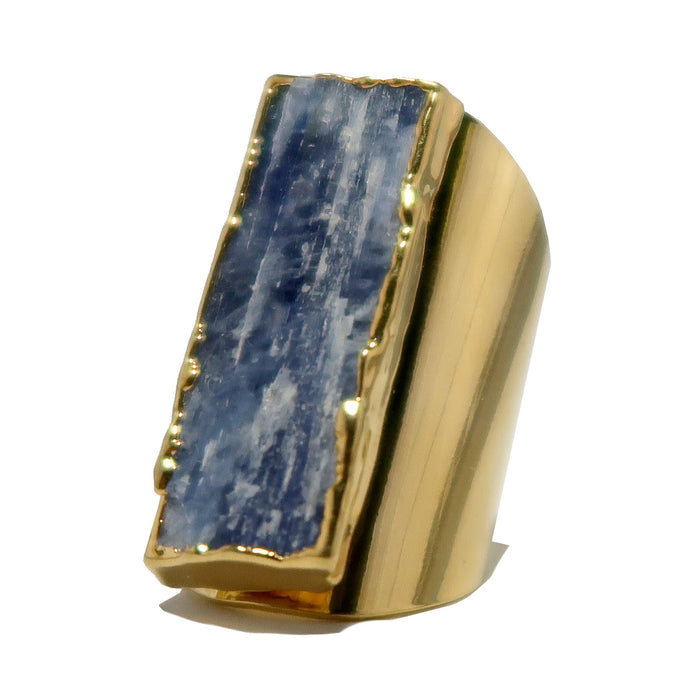 Gold ring with a blue Kyanite stone on a white background