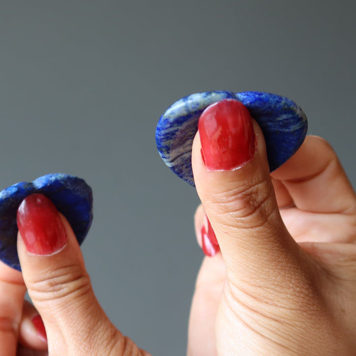 rubbing lapis lazuli worry stone heart
