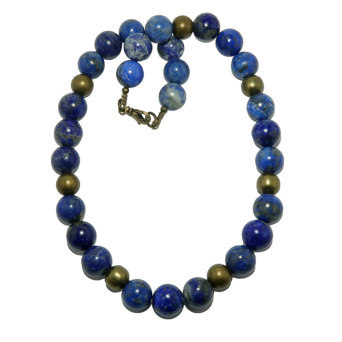 Lapis Lazuli necklace with blue and gold beads on a white background