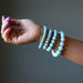larimar bracelets on wrist