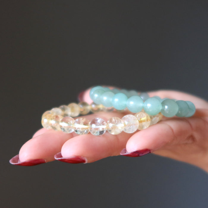 citrine and aventurine bracelet set on hand