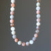 Moonstone Necklace with multicolored beads on a gray background