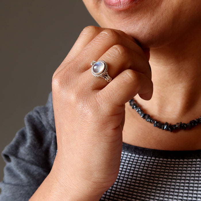 rainbow moonstone sterling silver ring on woman