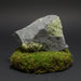 Mineral sample with green peridot crystals 