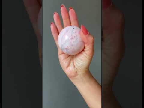 video on peruvian rhodonite sphere