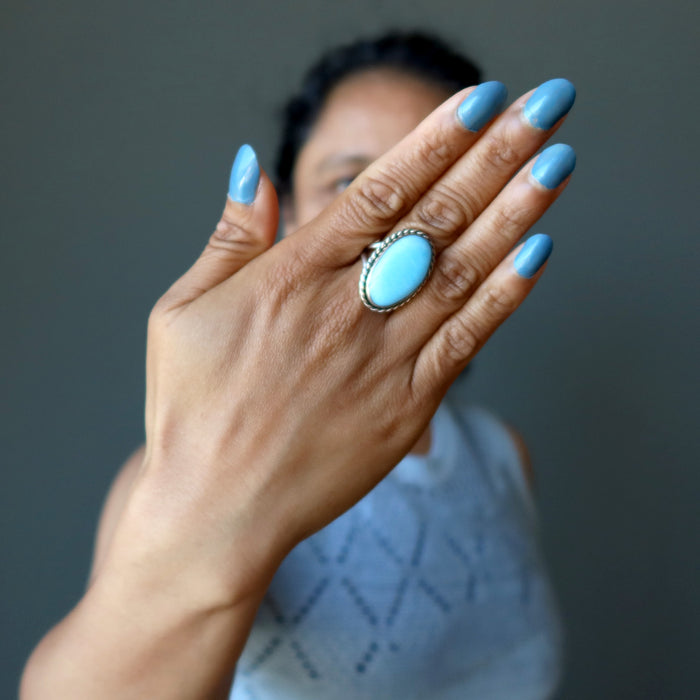 woman wearing blue quartz ring