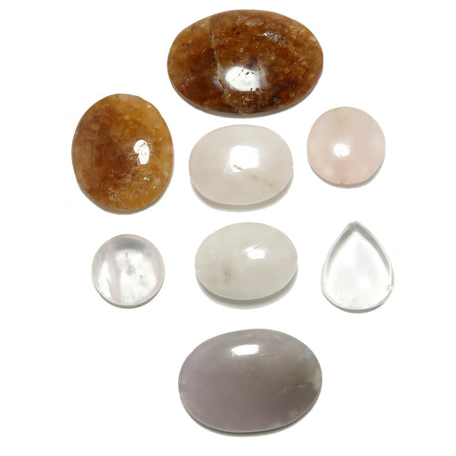 Collection of various stones on a white background