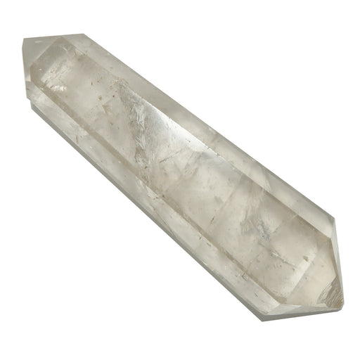 Clear quartz crystal wand on a white background