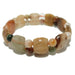 Beaded bracelet with natural stones on a white background