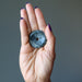 tourmalinated quartz amulet in hand