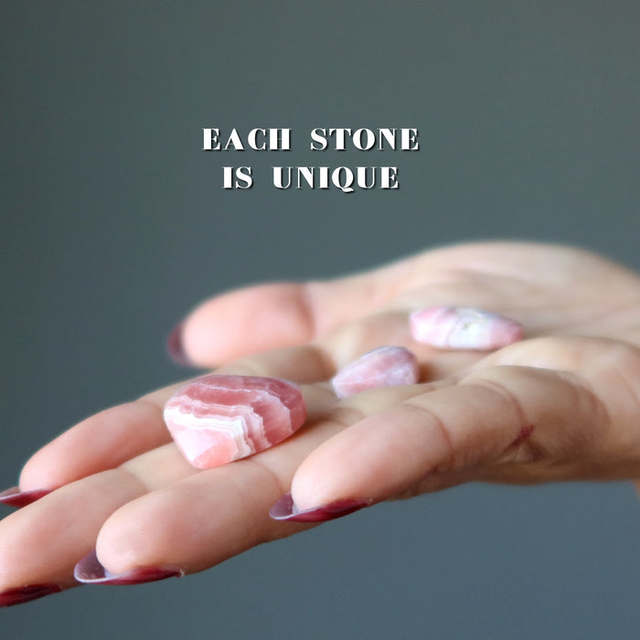 rhodochrosite hearts in hand