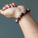 rhodonite bracelet on wrist