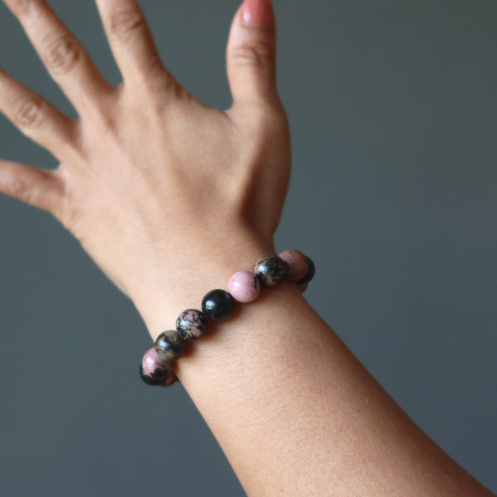 rhodonite bracelet on wrist