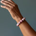 rhodonite bracelet on wrist