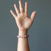 rhodonite bracelet on hand