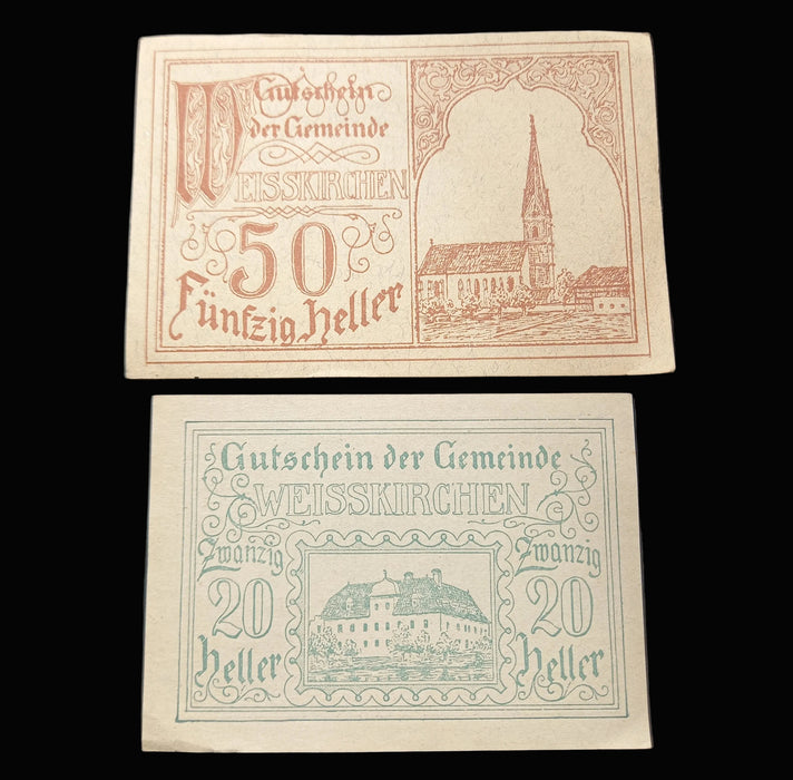 Two vintage banknotes from Weisskirchen with architectural illustrations on a black background