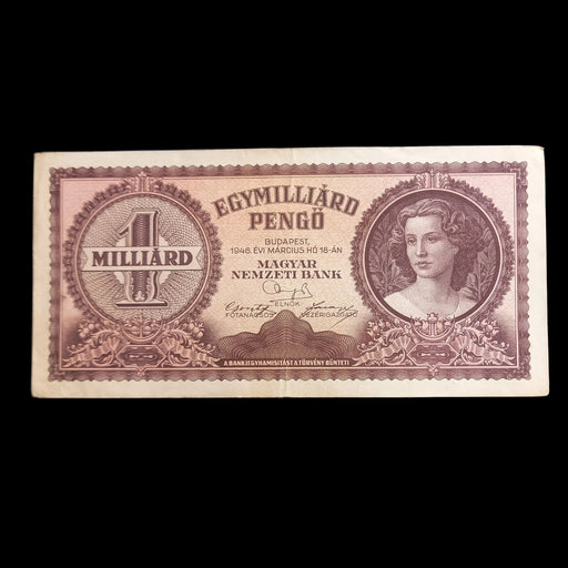 A vintage Hungarian 1 billion forint banknote from 1945, featuring a portrait and ornate decorative details, displayed flat against a black background.