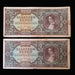 Two vintage Hungarian 100,000 pengo banknotes from the Magyar Nemzeti Bank, displayed vertically on a dark background.