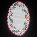 Hungarian kalosai Embroidered floral doily on a dark background