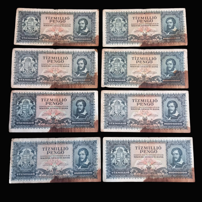 Set of Hungarian banknotes from the early 20th century on a dark background