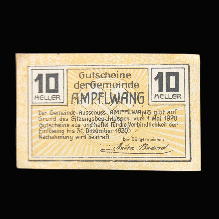 Vintage 10 Heller banknote from Ampflwang on a dark background