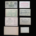 A set of vintage German banknotes and paper vouchers arranged on a dark background, including notes of 20, 30, 50, and 70 Heller with printed text and illustrations.