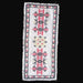 Mid-century Hungarian cross-stitched table runner with red and black geometry and fringed border