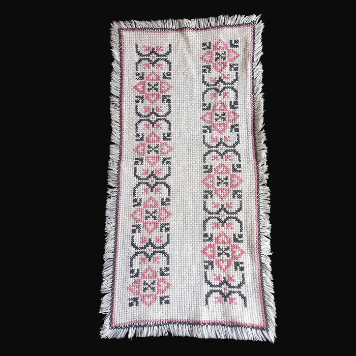 Hungarian vintage Small embroidered textile with geometric tulip pattern on a black background