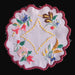 kalocsa style doily from hungary showing flowers and yellow peppers with a maroon border