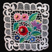 Embroidered floral design with a lace border on a black background