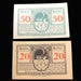 Two vintage German banknotes notgelds with 'Heller' and numbers printed on them.