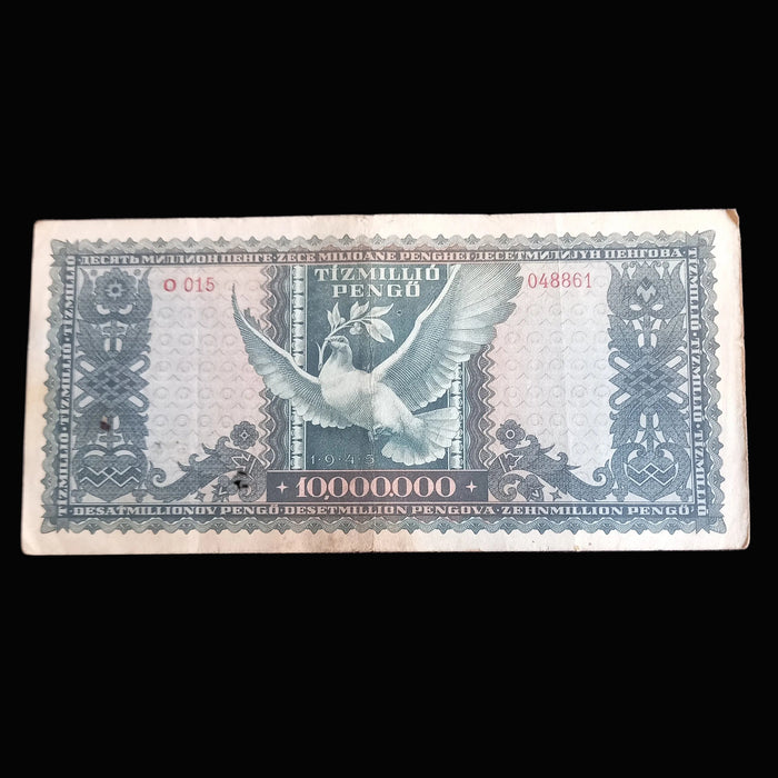 Vintage Hungarian banknote with a dove design on a dark background
