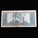 Vintage Hungarian banknote with a dove design on a dark background