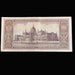 Vintage Hungarian banknote with architectural design on a dark background