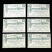 Six identical old German banknotes on a dark background