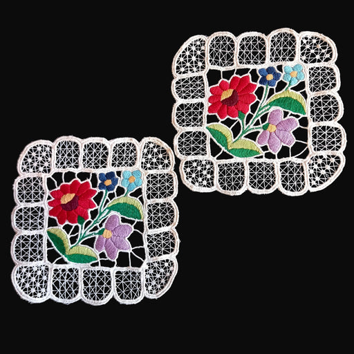 pair of square hungarian kalocsai doilies with flower patterns and white lace