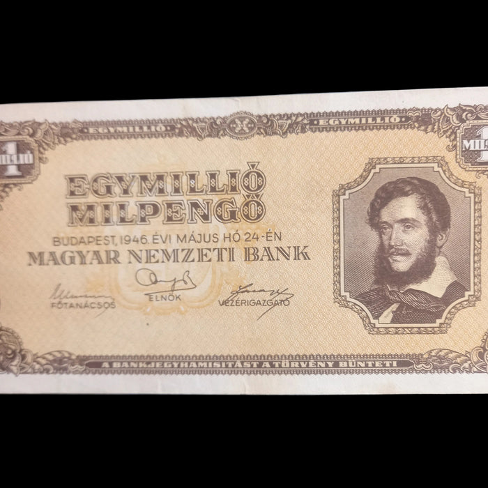 A vintage Hungarian 100 million forint banknote from 1946 issued by the Budapest 1946. Evi Május Hó 24ó¿n Magyar Nemzeti Bank, shown against a dark background.