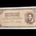 A vintage Hungarian 100 million forint banknote from 1946 issued by the Budapest 1946. Evi Május Hó 24ó¿n Magyar Nemzeti Bank, shown against a dark background.