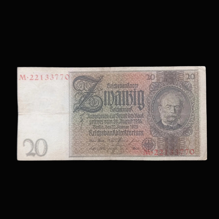 A vintage German 20 Reichsmark banknote from August 1926, displayed flat against a dark textured fabric background.